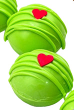 Load image into Gallery viewer, Grinch mug and Cocoa Bomb.